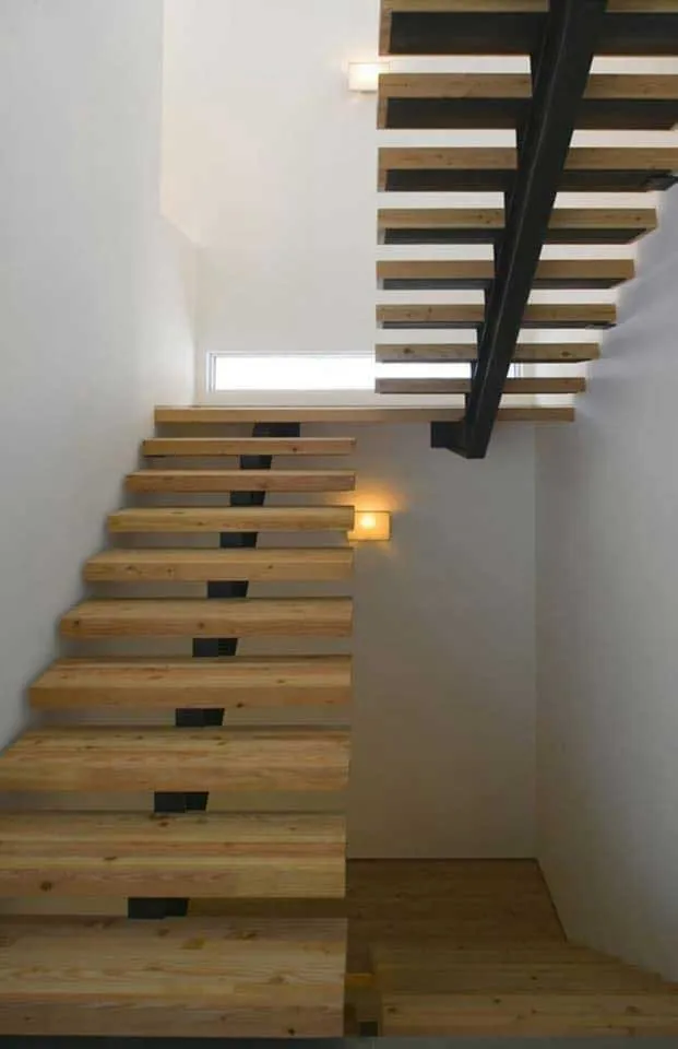 Modern floating staircase with oak and steel in Barnet