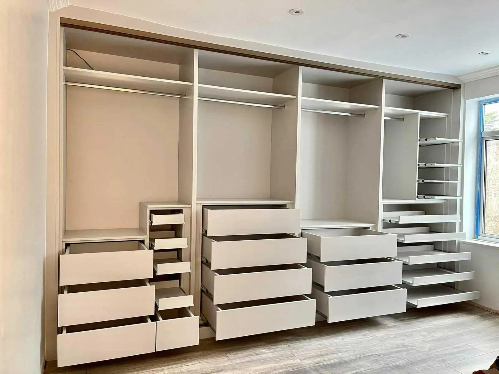 Bespoke fitted wardrobe with drawers and storage in Harpenden